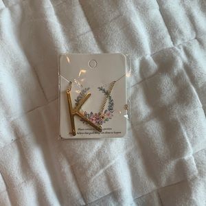 Gold K necklace